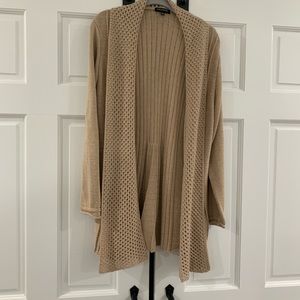 New, no tags, never worn, open cardigan. Very nice!